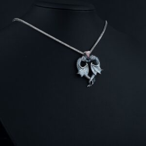 The Dragon Heart Pendant is a product of high class craftsmanship and intricate designing. It's solid structure makes it a perfect piece to use as an everyday jewelry to elevate your style.